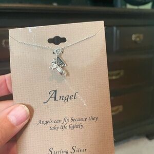 Lot of costume jewelry.  Some sterling silver